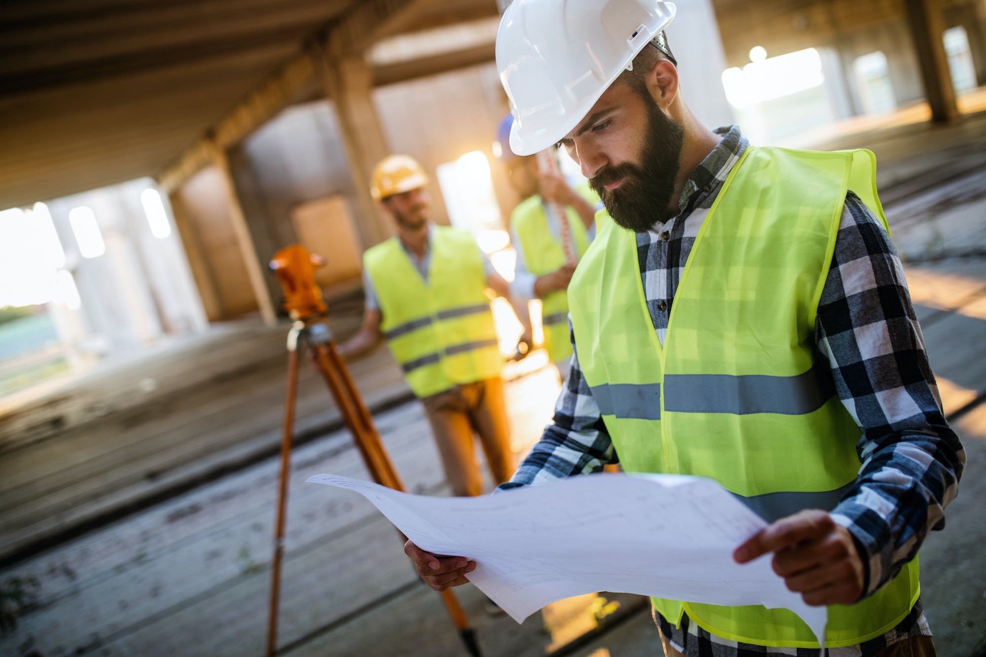 Construction concept of engineer and architect working at construction site